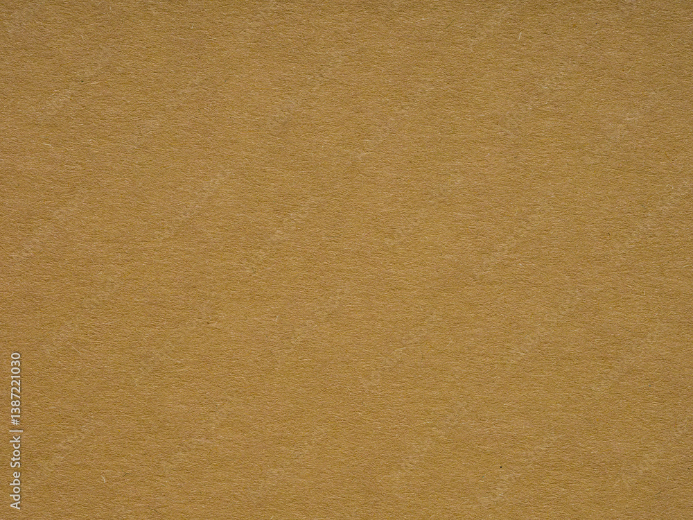A canvas of amber, the paper's texture is a silent ode to the simplicity and beauty of the mundane