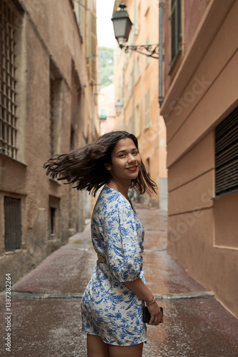 Obraz na płótnie Beautiful young mixed race woman in the old town of Nice, France w salonie