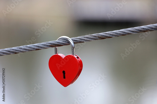 Obraz na płótnie Padlock in heart shape. Lock hanging in a river bridge, symbol of eternal love w salonie