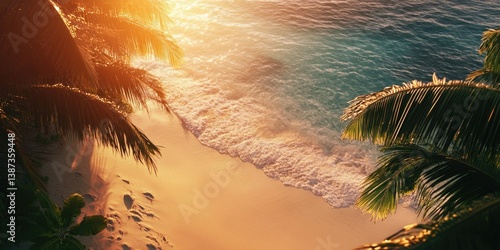 Tropical beach with palm trees and sunset reflection on water