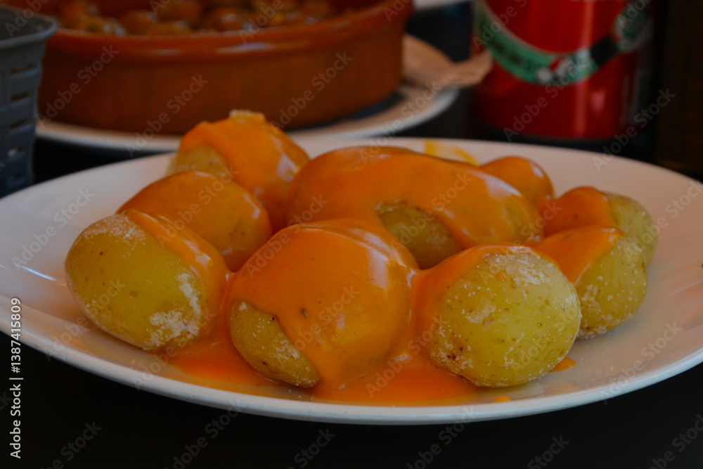 Wrinkled potatoes (spanish: papas arrugadas). Potatoes with mojo picon, typical dish of Canarian food, Gran Canaria, Spain Wrinkled potatoes (spanish: papas arrugadas). Potatoes with mojo picon, typical dish of Canarian food, Gran Canaria, Spain