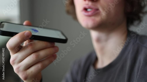 Vertical screen artificial intelligence listens as user speaks into phone mic close up futuristic voice command smooth AI interaction blending smart tech and natural conversation