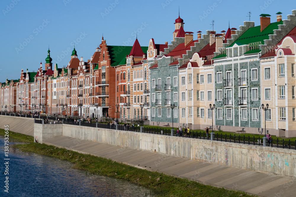 Naklejka premium A fragment of the Brugge embankment on a sunny August evening, Yoshkar-Ola