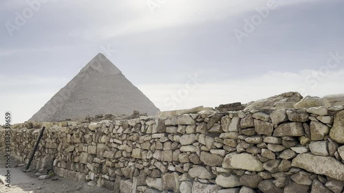 Explore the Great Pyramid of Keops in Giza, Egypt, a true Wonder of the World. Witness its ancient majesty and architectural brilliance on the Giza Plateau.