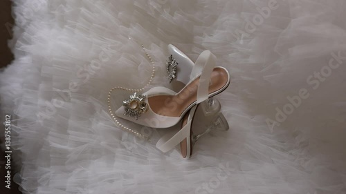 bride's wedding shoes in the room in the morning