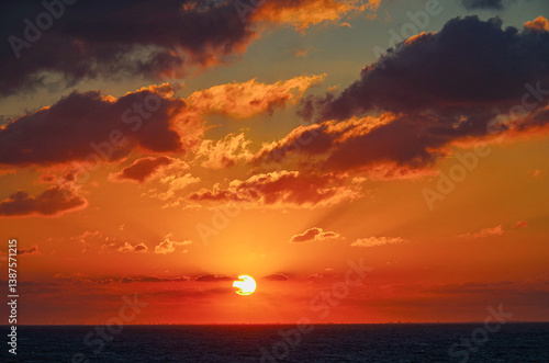 Obraz na płótnie Beautiful breathtaking sunset blue hour twilight panorama at sea with dramatic sky seen from outdoor deck of classic cruiseship cruise ship liner sailing on ocean w salonie