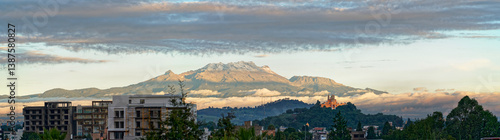 Cholula, Mexico - August 1, 2024: Panoramic photo of Iztaccíhuatl volcano with sky, clouds and hills