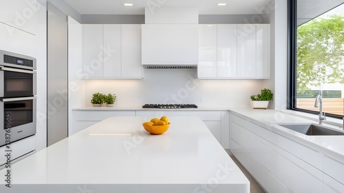 Minimalist and Stylish Kitchen Countertop with Natural Lighting and Decor long_title:This image showcases a beautiful and minimalist kitchen