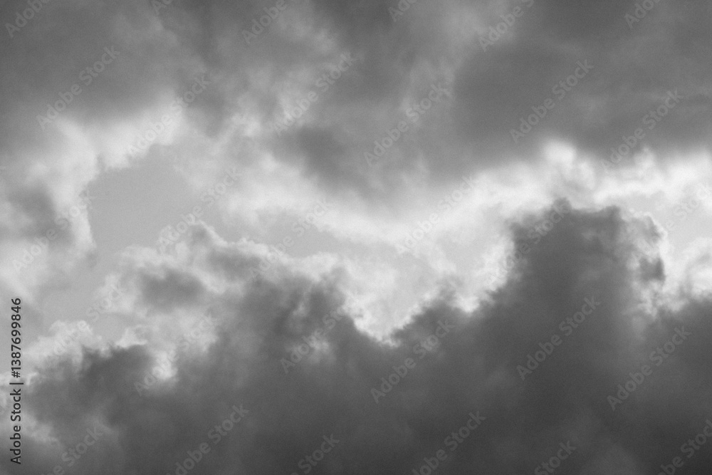 Dramatic black and white clouds photographed as high-resolution texture. Idea for background or sky replacement, photo retouching or artistic composities. Can be use as overlay or texture in editing Dramatic black and white clouds photographed as high-resolution texture. Idea for background or sky replacement, photo retouching or artistic composities. Can be use as overlay or texture in editing