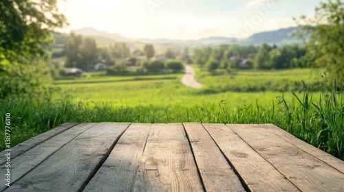 Rustic wooden surface overlooking a verdant rural landscape at day time