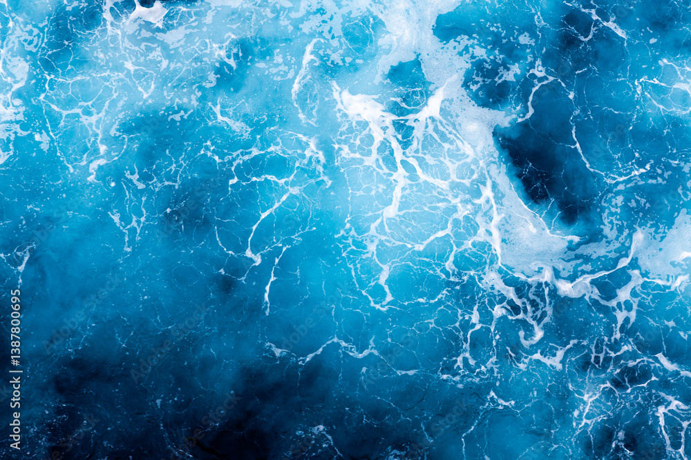 Sea water surface background. Aerial view of classy foamy water. Can be used in covers, packaging, posters, textures, cards, art and design projects. Picturesque nature background image. Sea water surface background. Aerial view of classy foamy water. Can be used in covers, packaging, posters, textures, cards, art and design projects. Picturesque nature background image.