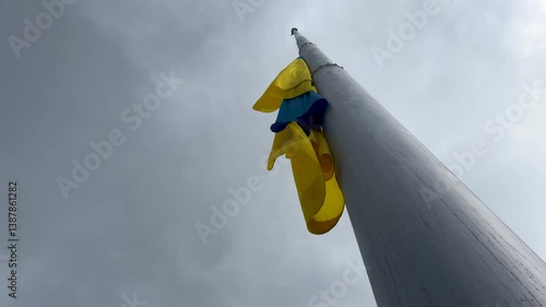 Highly detailed fabric texture flag of Ukraine. Slow motion of Ukraine flag waving background sky blue and yellow national color Ukrainian yellow-blue. Ukraine flag wind waving national symbol country