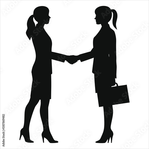 Photos Professional Businesswomen Exchanging a Friendly Handshake/Silhouette of two businesswomen shaking hands, a professional and amicable scene
