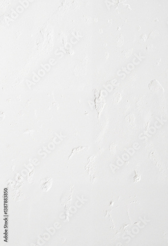 Textured hand-applied gypsum plaster on rugged surface, artistic detail