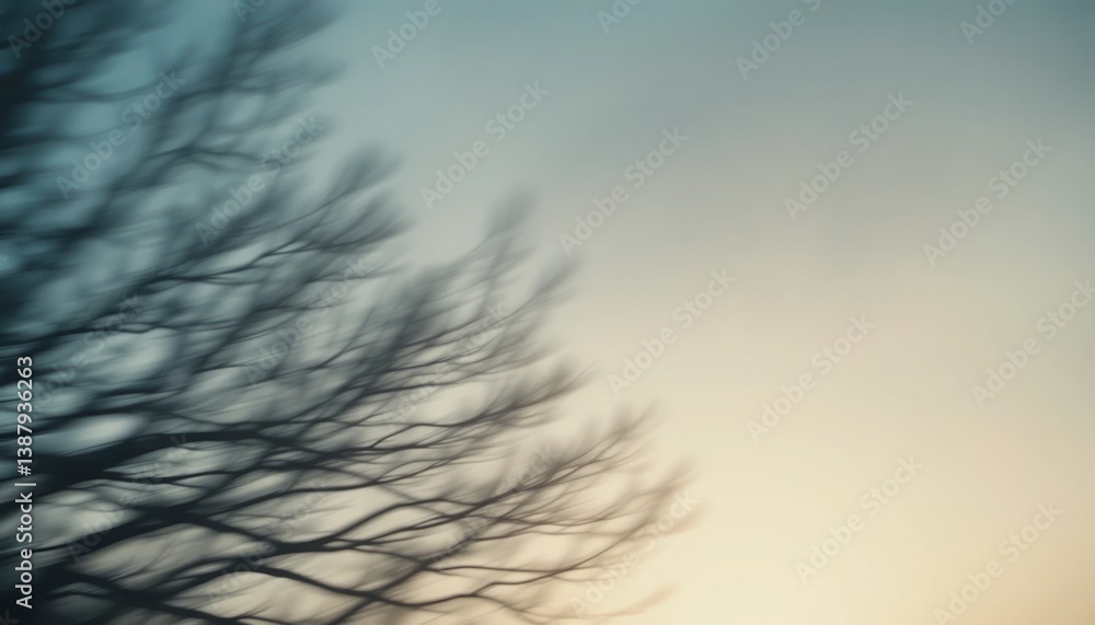 Fototapeta premium Nature's tranquil landscape at dusk capturing the serenity of bare trees against a colorful sky peaceful environment artistic perspective