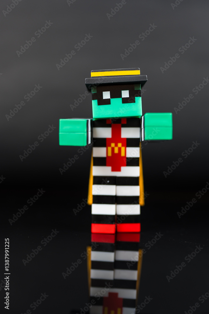 Naklejka premium Bangkok, Thailand - April 6, 2025 : Toy of Zombie hamburglar form McDonald. Blind box toy from McDonald's collaboration with Minecraft movie.