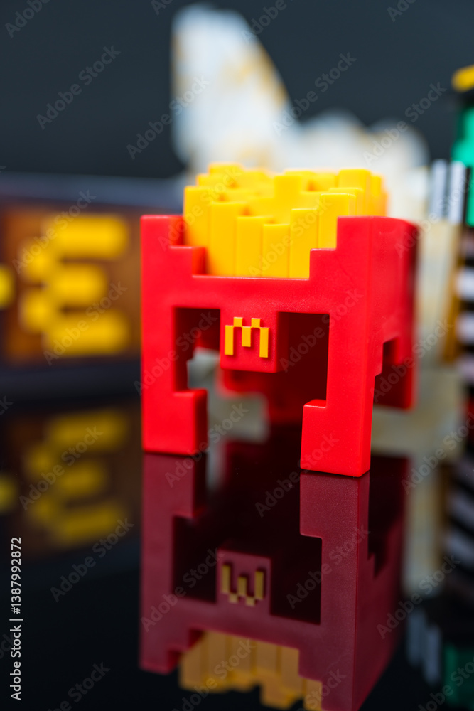Fototapeta premium Bangkok, Thailand - April 6, 2025 : Fry Helmet Minecraft from McDonald, Toy form Minecraft blind box from McDonald's collaborates Minecraft the movice