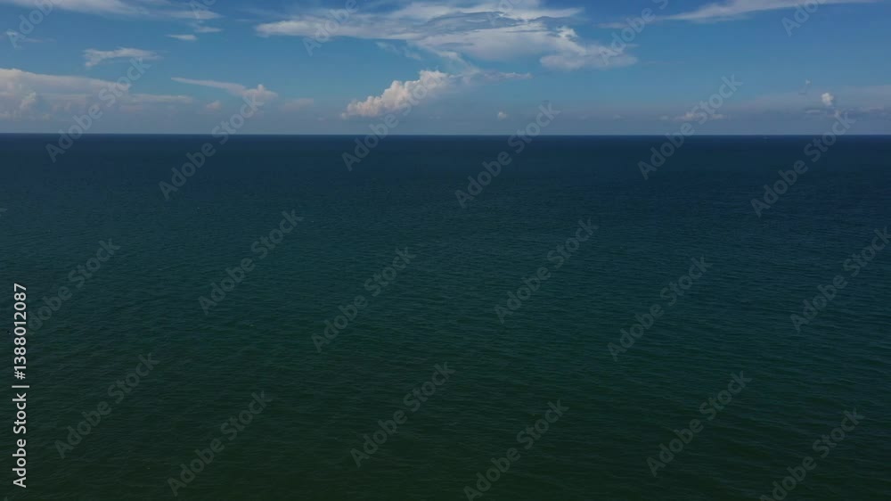 Sea water surface. Aerial view over clear azure sea water. Abstract nautical summer ocean nature. Holiday, vacation and travel concept. Sea water surface. Aerial view over clear azure sea water. Abstract nautical summer ocean nature. Holiday, vacation and travel concept.