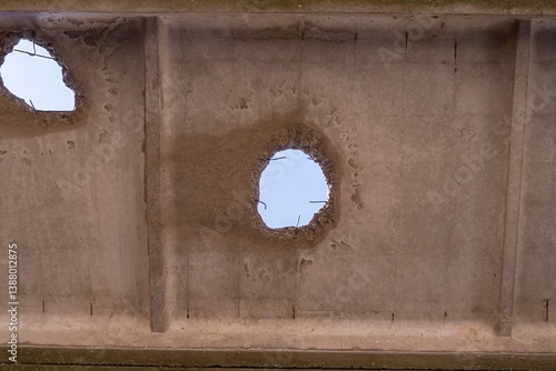 Foto Cracked, holey concrete surface for background