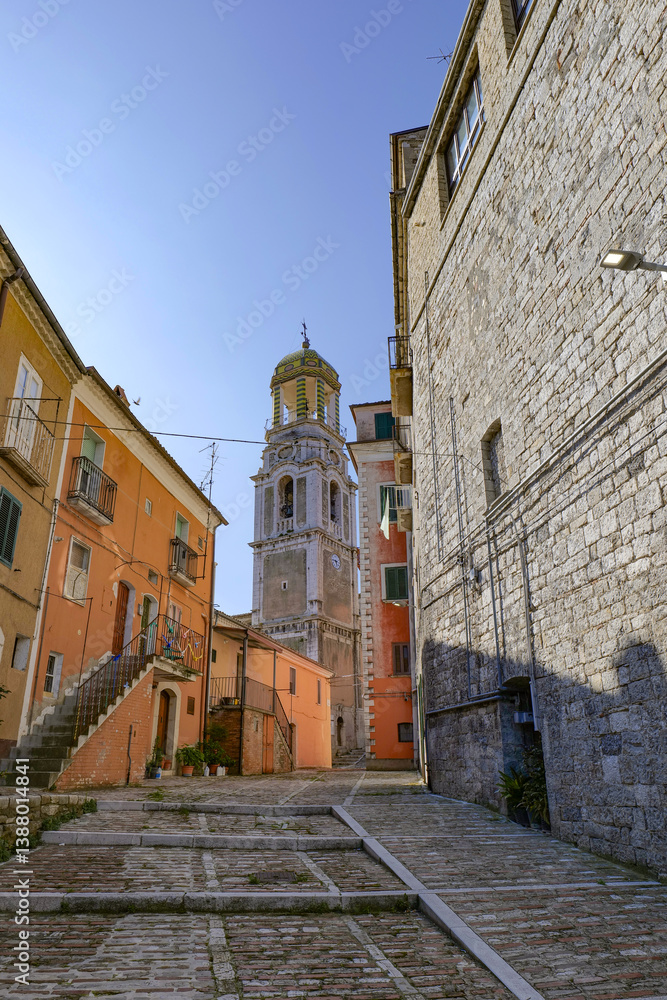 A narrow street among the old houses of Ripamolisani, a medieval village in Molise, Italy.
