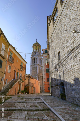 Obraz na płótnie A narrow street among the old houses of Ripamolisani, a medieval village in Molise, Italy. w salonie