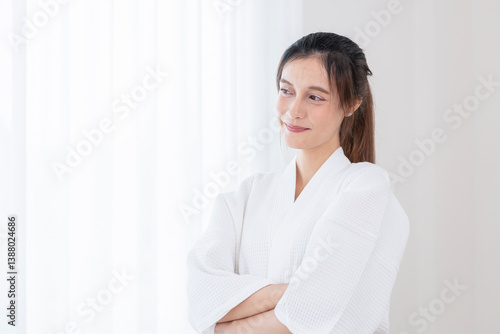 portrait young pretty woman in bathrobe standing in spa room with copy space for text Free Download portrait young pretty woman in bathrobe standing in spa room with copy space for text - GFXLoad