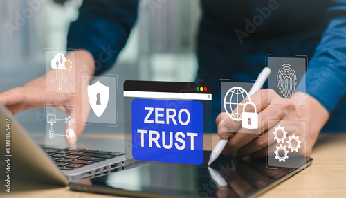 Fotografía Zero Trust Security Concept, Businessman using laptop and tablet for strictly verify credentials of every person and device on virtual screens for business data security networks