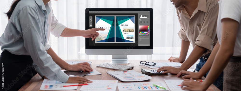 Graphic designer software for modern design of web page and commercial brisk ads showing on the computer screen