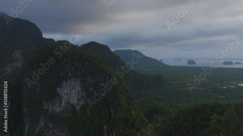 Beautiful drone shot of limestone cliffs and natural green scenery in Krabi, Thailand.