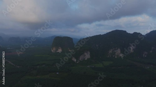 Beautiful drone shot of limestone cliffs and natural green scenery in Krabi, Thailand.