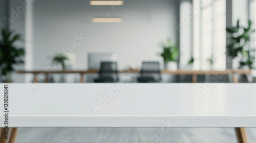 Wallpaper Mural A modern office space with a clean white table in the foreground, featuring minimalist furniture and plants in a bright, spacious environment. Torontodigital.ca
