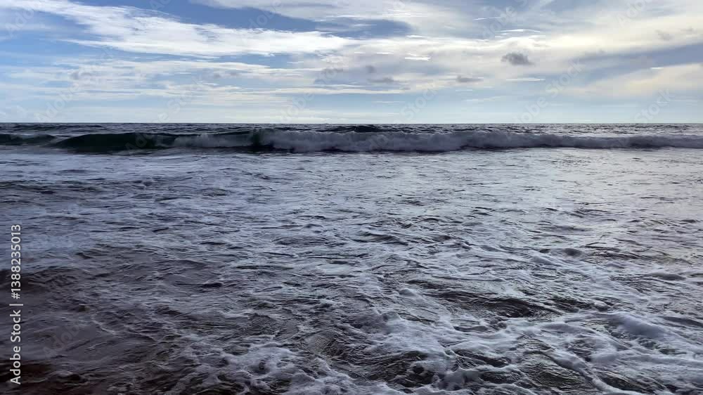 Ocean wave and clear sky, slow motion Ocean wave and clear sky, slow motion