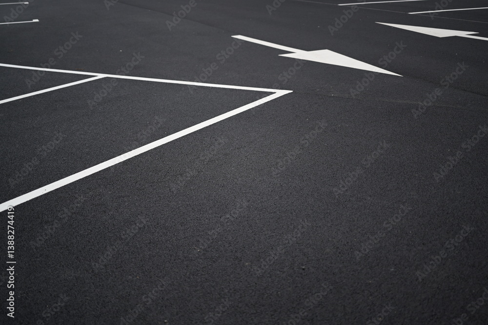 white arrow on gray asphalt, turn left, turn right, abstract white lines on asphalt, background of asphalt texture and white lines
white arrow on gray asphalt, turn left, turn right, abstract white lines on asphalt, background of asphalt texture and white lines
