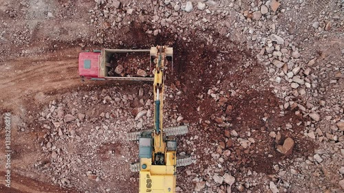 Excavator Loading Soil into Dump Truck at Construction Site | Earthmoving Operation