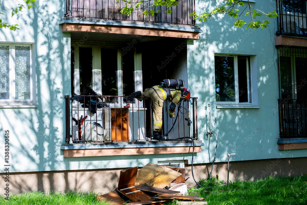 A balcony filled with a variety of appliances and scattered debris, creating a messy environment