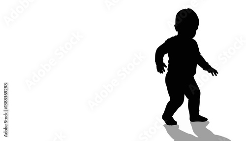 Toddler takes first steps in silhouette, learning to walk