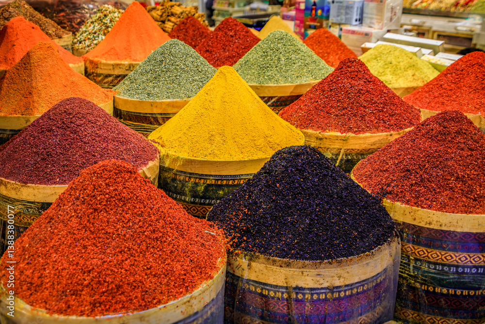 Orange paprika and colorful spices at a vibrant bazaar market, Istanbul, Turkey