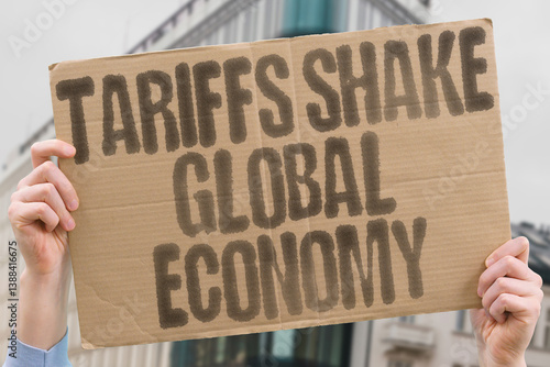 Wallpaper Mural "Tariffs Shake Global Economy" on worn cardboard. Highlights impact of new import taxes on international markets. UNCERTAINTY. INSTABILITY. TRADE. FINANCE. MARKETS. BUSINESS. INTERNATIONAL Torontodigital.ca