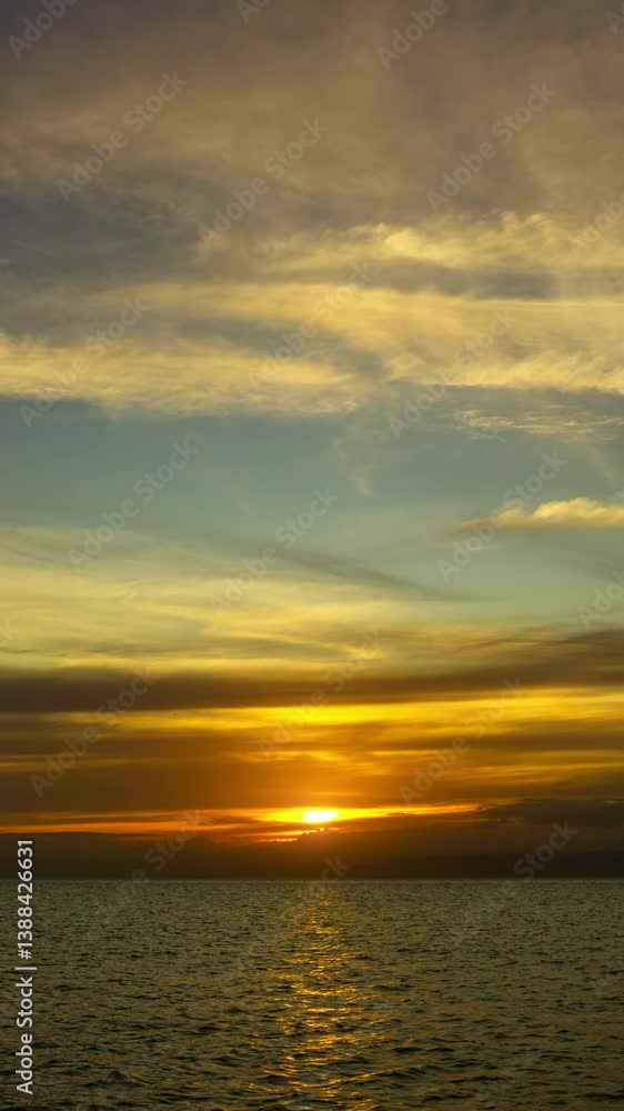 Sea surface during a beautiful colourful sunset, timelapse. Vertical video 4k Sea surface during a beautiful colourful sunset, timelapse. Vertical video 4k
