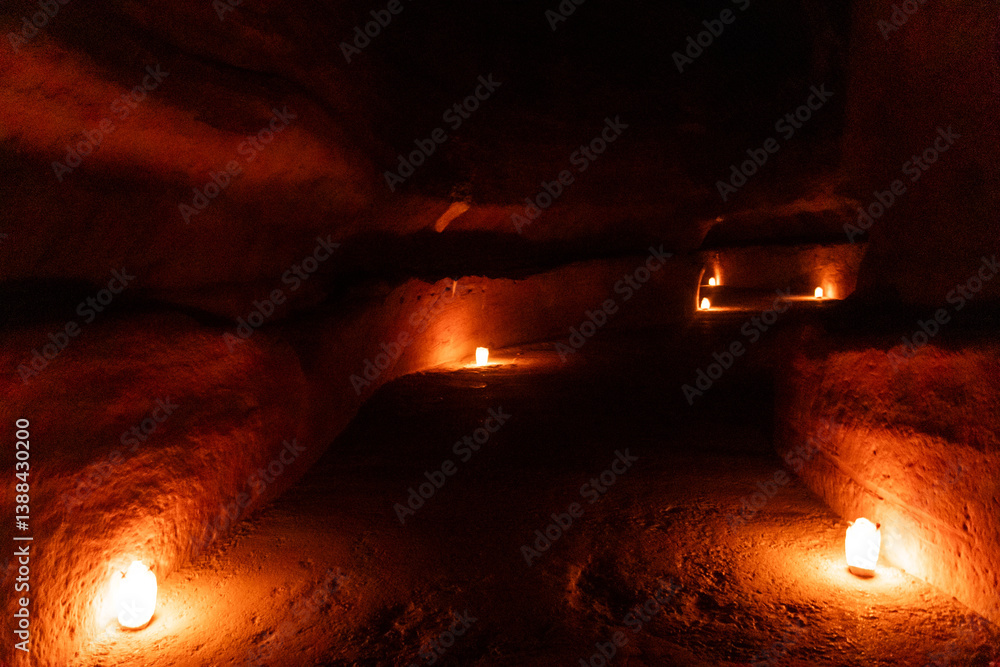 Candles along the Siq gorge, main entrance to the ancient city Petra, during Petra by Night, Jordan