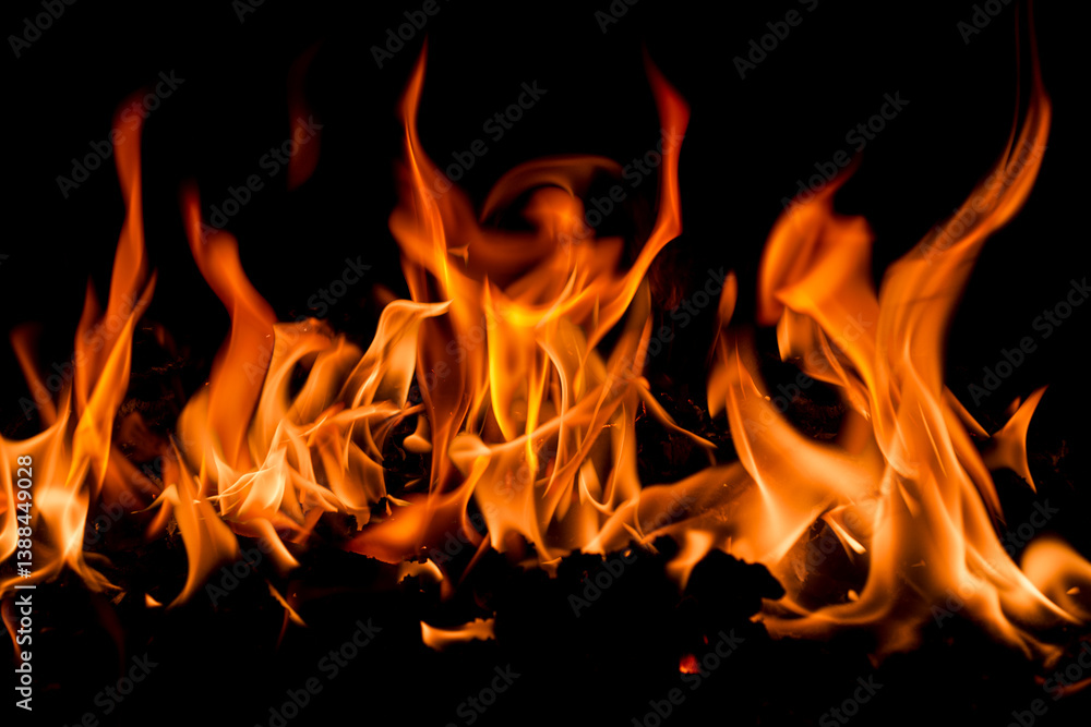 Fire flame background. Hell bonfire. Texture of fire on a black background. Blaze flames background for banner. Burning flames. Fire texture. Fire flame background. Hell bonfire. Texture of fire on a black background. Blaze flames background for banner. Burning flames. Fire texture.