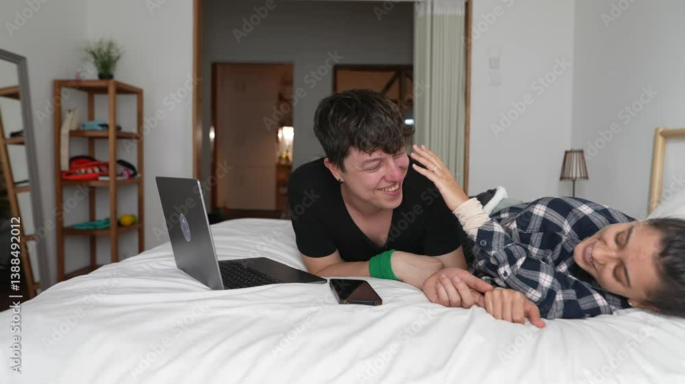 Enjoying Playful and Joyful Moments Between Friends in a Cozy and Welcoming Room Enjoying Playful and Joyful Moments Between Friends in a Cozy and Welcoming Room