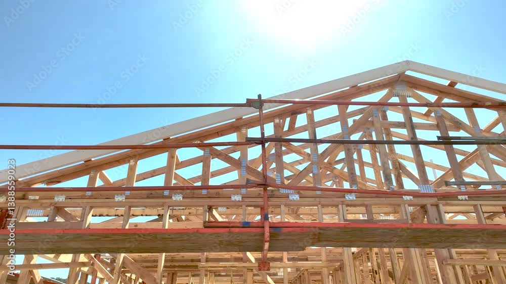 Dramatic Slow Motion Panning Movement of New Home Wood Framing Construction Site. Dramatic Slow Motion Panning Movement of New Home Wood Framing Construction Site.
