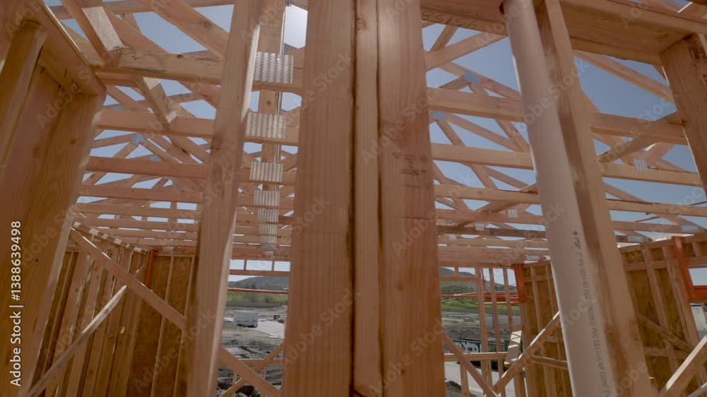 Dramatic Slow Motion Panning Movement of New Home Wood Framing Construction Site. Dramatic Slow Motion Panning Movement of New Home Wood Framing Construction Site.