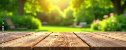 Empty wooden table, summer backyard party, blurred background, grass, green, sun
