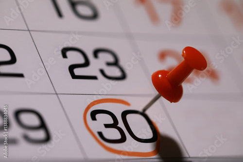 Obraz na płótnie Marked Calendar Date with Red Thumbtack Highlighting Day 30 in Close-Up View w salonie