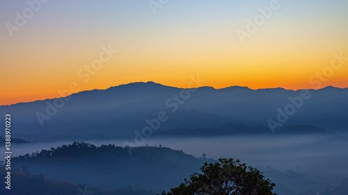 Wallpaper Mural Time lapse An image of sweet sky in sunrise above a valley of mist.
High peaks wonderful morning sunrise natural Landscape. 
Beautiful sunset tropical landscape background. Torontodigital.ca