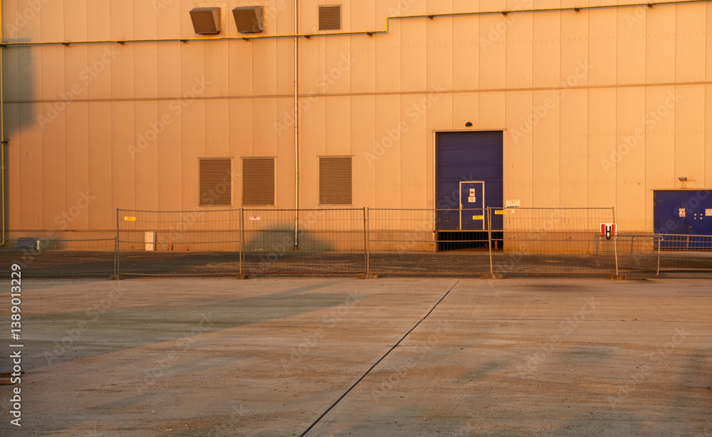 Facade of modern factory hall,wall,door and floor