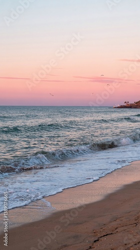 A stunning sea view with a sandy shore, showcasing a vibrant landscape with vivid colors. Tranquil waves meet golden sands under a breathtaking sky, perfect for travel and nature themes. 