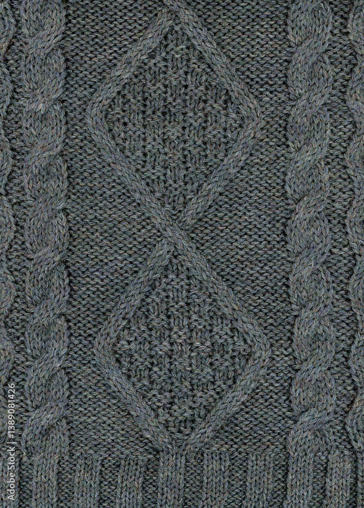 Pure wool Aran knitted grey jumper heavy chunky cord diamond pattern texture detail background Pure wool Aran knitted grey jumper heavy chunky cord diamond pattern texture detail background